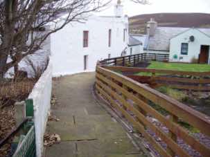 The path down from the museum to Spanish Closs, the archway on the left.
							